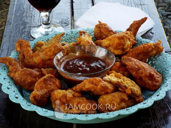 Фото блюда: Куриные крылышки в казане на костре