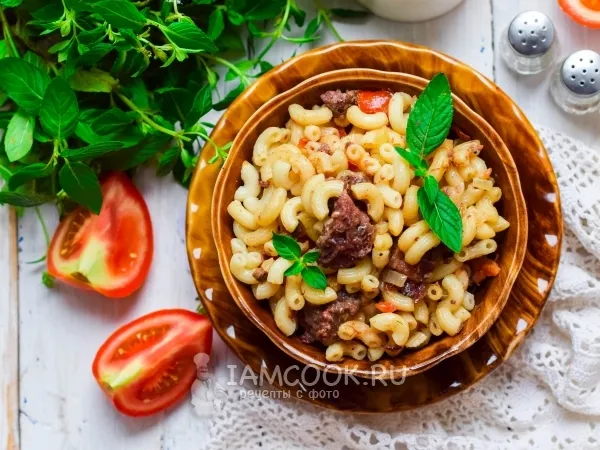 Фото блюда: Макароны с тушёнкой на сковороде