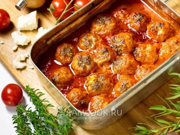 Фото блюда: Фрикадельки с сыром в томатном соусе в духовке