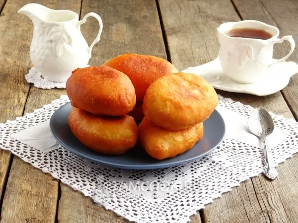 Фото блюда: Жареные пирожки с творогом на сковороде