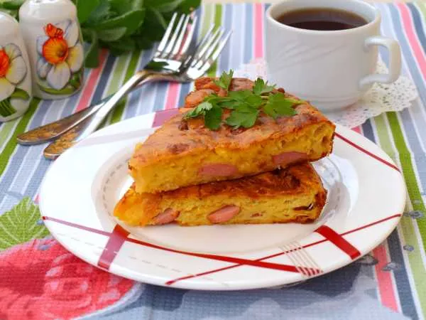 Фото блюда: Пирог с сосисками и сыром