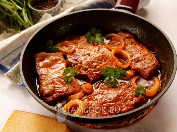 Фото блюда: Тушеные отбивные из свинины