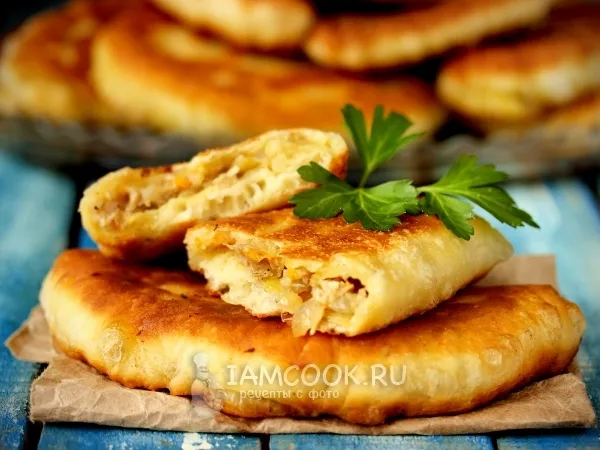 Фото блюда: Жареные пирожки с курицей, луком и морковью