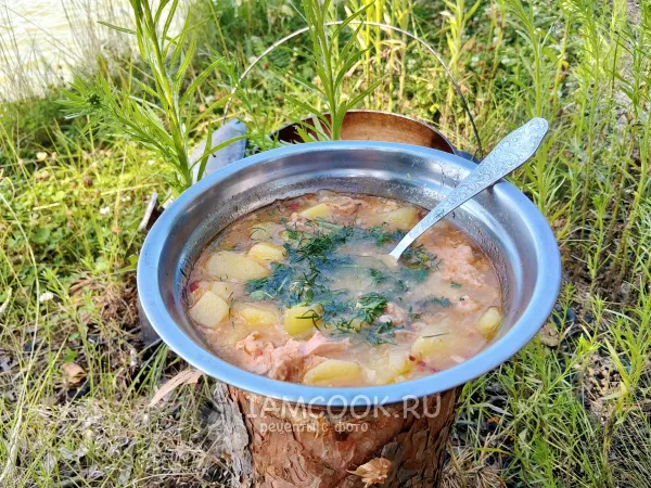 Фото блюда: Картошка с тушенкой в казане на костре