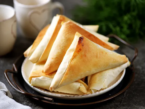 Фото блюда: Треугольники из теста фило (с творогом и адыгейским сыром)