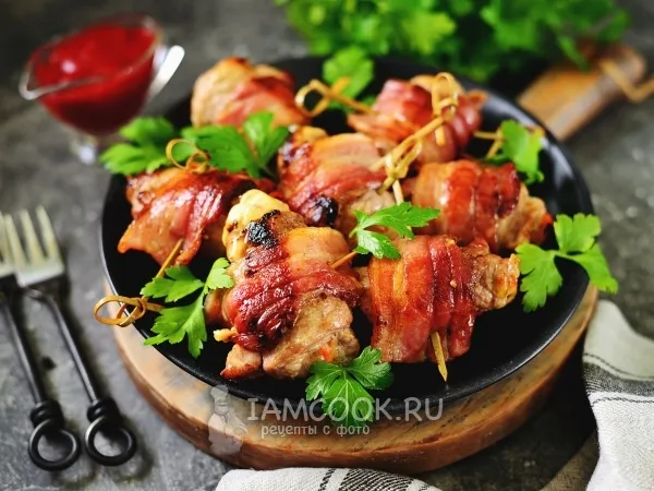 Фото блюда: Рулетики из свинины с корейской морковью и сыром в духовке