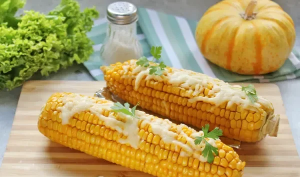 Фото блюда: Кукуруза в духовке с сыром