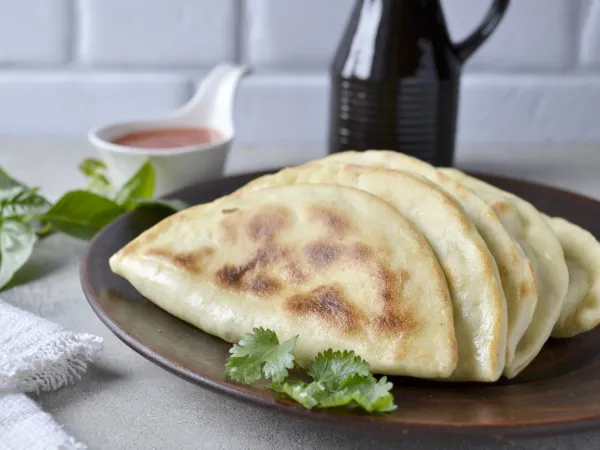 Фото блюда: Чуду по-дагестански с картошкой и зеленью на сковороде