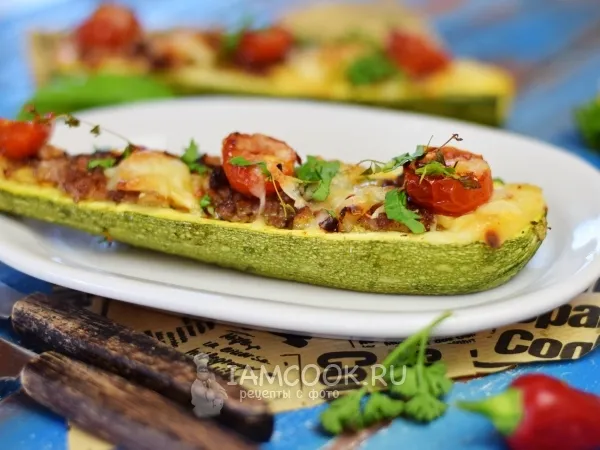 Фото блюда: Кабачки фаршированные фаршем запеченные в духовке