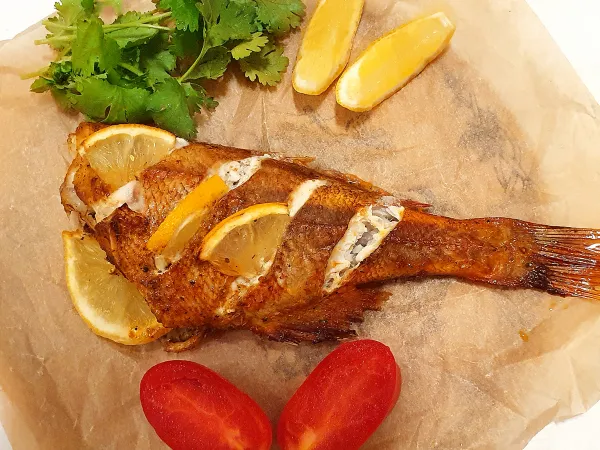 Фото блюда: Морской окунь в духовке с лимоном