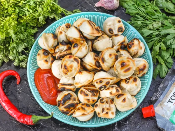 Фото блюда: Пельмени на мангале на решетке