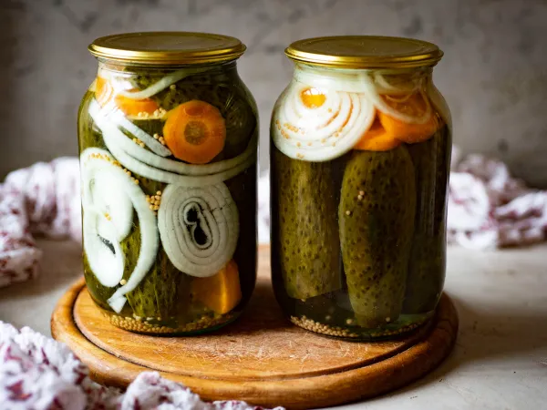 Фото блюда: Маринованные огурцы с луком и морковью на зиму