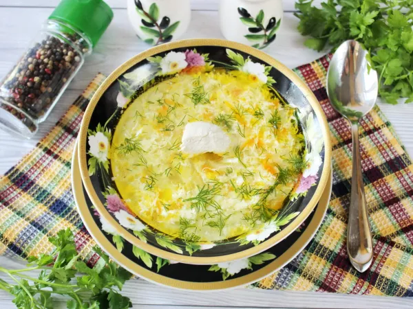 Фото блюда: Кудрявый суп с яйцом и курицей