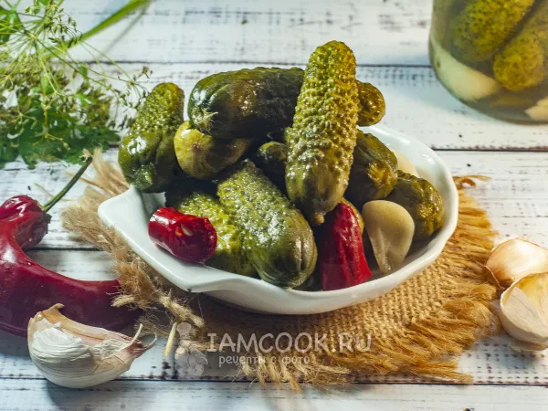 Фото блюда: Маринованные огурцы сладко-острые на зиму